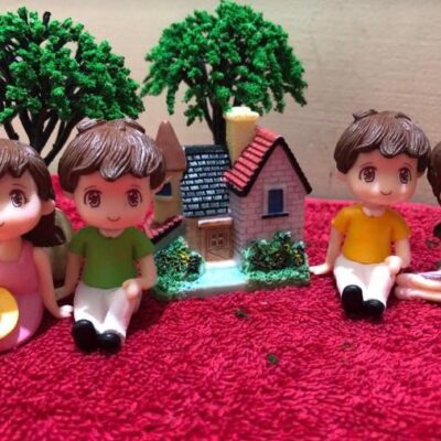 Miniature Boy and Girl Sitting with Cap Red Garden Fairy Garden Figurine